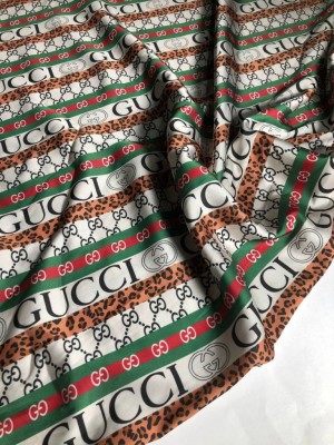 Шелк "Армани" с логотипом "Gucci"